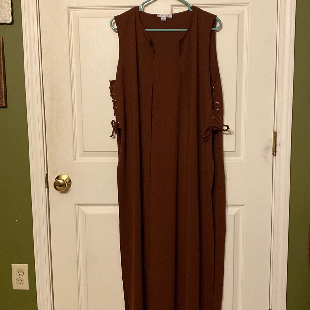 Floor length vest with rivets & braided sides. Very simple